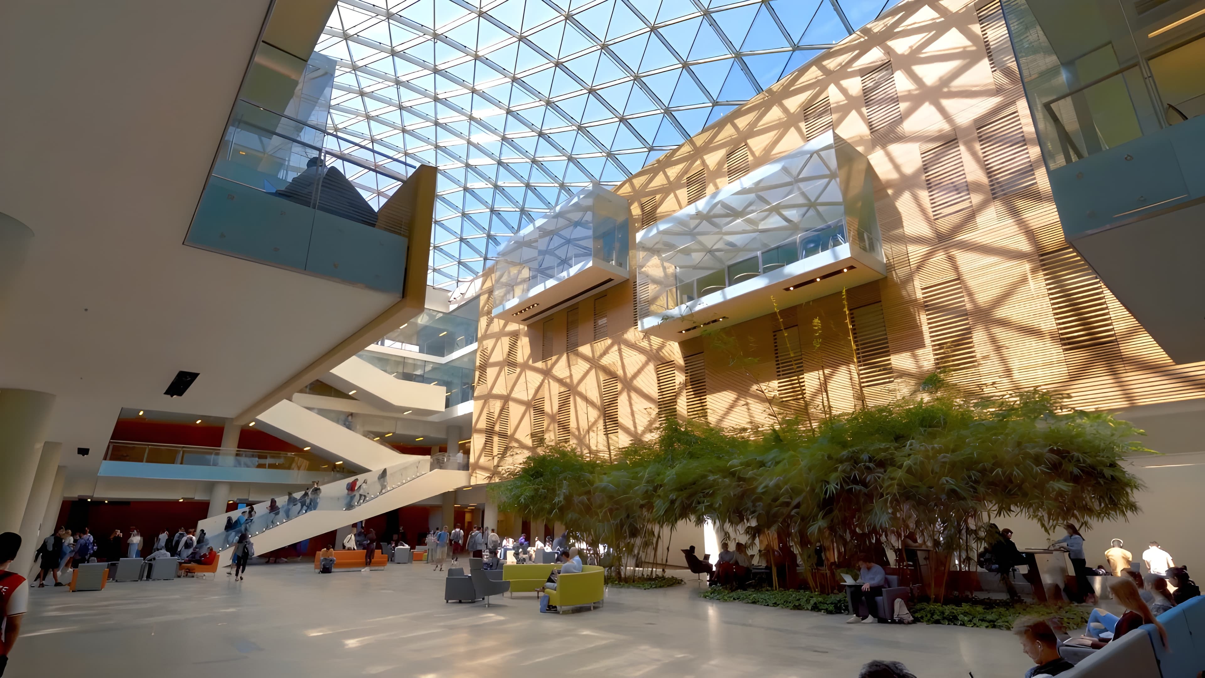 Students networking inside the Lazaridis Hall atrium